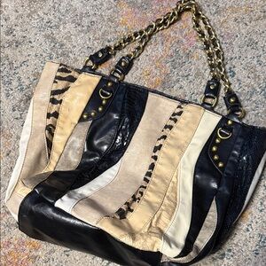 Carlos by Carlos Santana Black and Cream Patchwork Hobo Bag